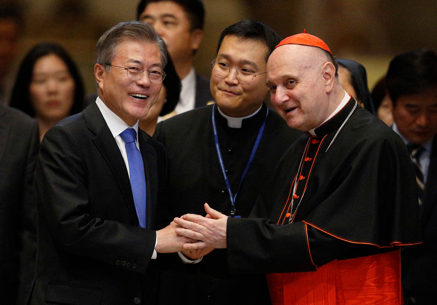 South Korean President Moon Jae-in greets Cardinal Angelo Comastri, archpriest of St. Peter’s Basilica, before a Mass for peace for the Korean peninsula in St. Peter’s Basilica at the Vatican Oct. 17. The Mass was celebrated by Cardinal Pietro Parolin, Vatican secretary of state.
